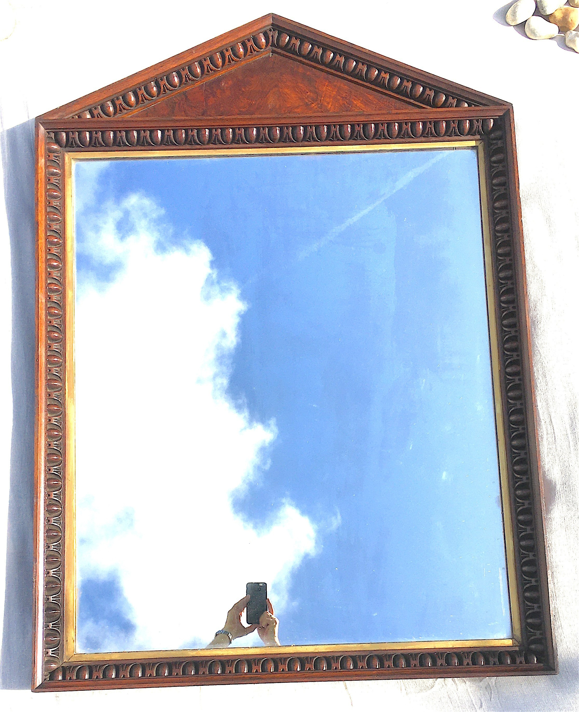 A George IV oak and pollard oak arched overmantel mirror with gilt slip, width 96cm, height 136cm